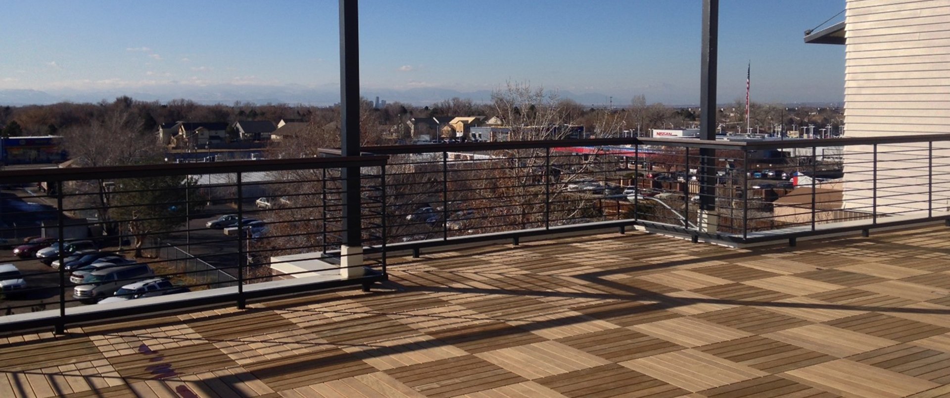 A rooftop terrace on a multi-family residential building